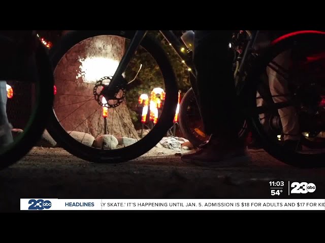 ⁣Kernville carolers spread Christmas cheer while riding bikes