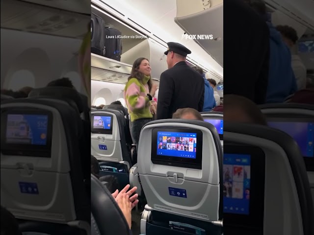 ⁣Pilot steps out of the cockpit to hug a passenger who saved his life with a bone marrow donation