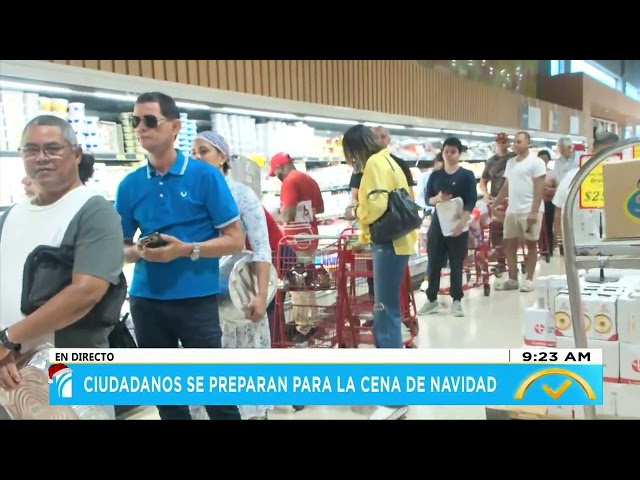 ⁣Ciudadanos se preparan para la cena de navidad