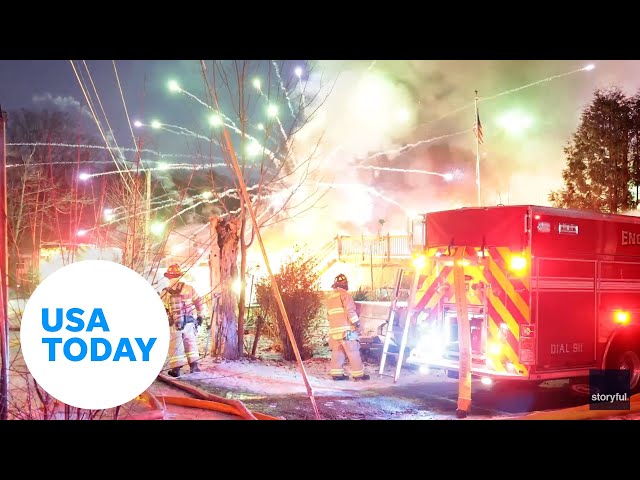 ⁣Firefighters battle exploding fireworks as fire engulfs several homes | USA TODAY