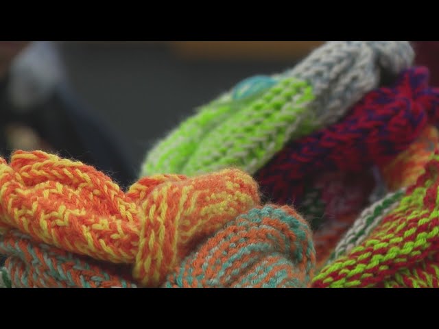 ⁣Group creates thousands of hats to support cancer patients in treatment