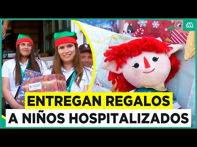 ⁣Dan regalos a niños hospitalizados: "Viejito Pascuero" pasó por el Hospital Calvo Mackenna