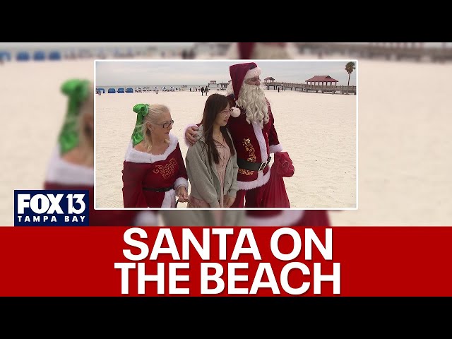 ⁣Santa and Mrs. Claus take to the beach in Clearwater to spread Christmas cheer