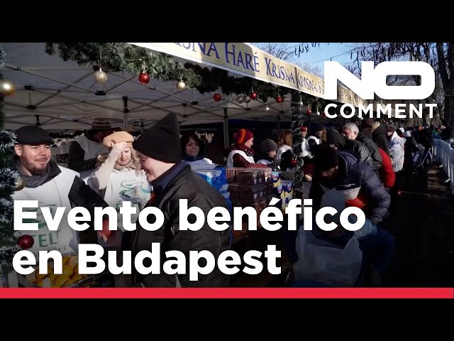 ⁣NO COMMENT: Miles de personas reciben comida en un evento benéfico navideño en Budapest