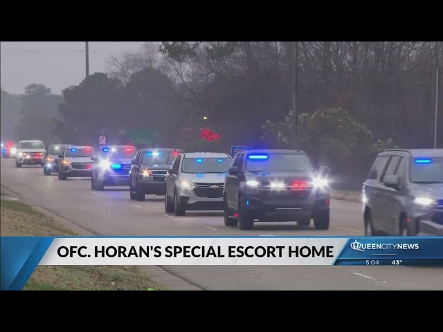 ⁣Multiple agencies escort Officer Michael Horan’s body back to Greensboro