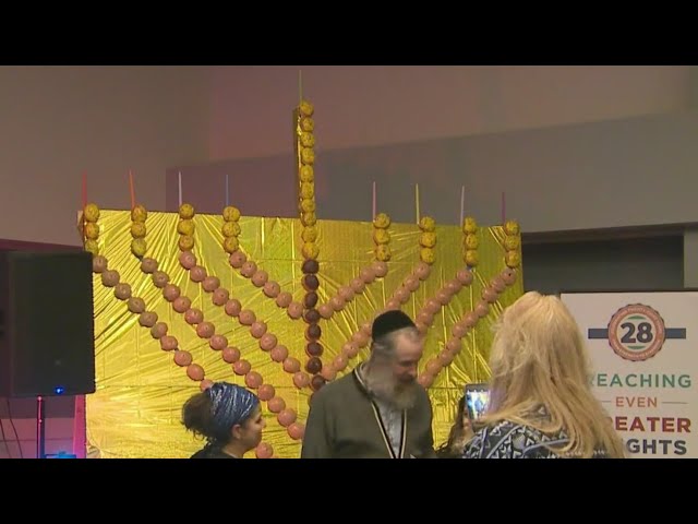 ⁣Denver organization teams up with Krispy Kreme for 'donut menorah'