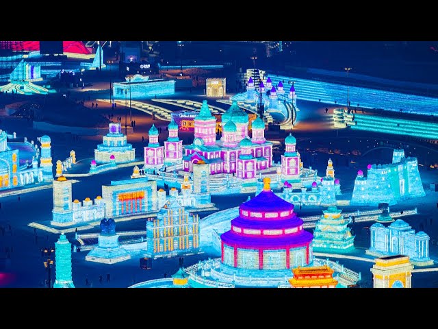 ⁣Live: Lights illuminate world's largest ice and snow theme park