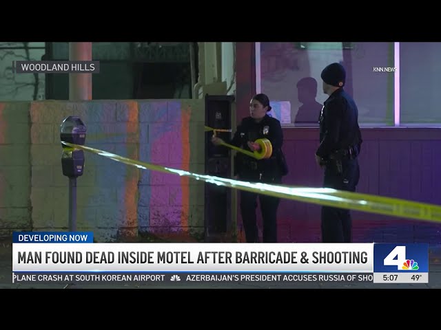 ⁣Man found dead inside motel after barricade and shooting