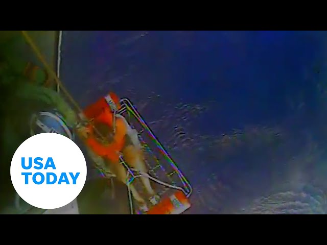 ⁣Coast Guard rescues two men after their boat capsizes | USA TODAY