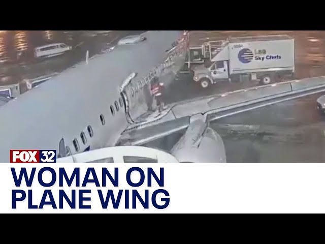 ⁣Across America: Woman on plane wing