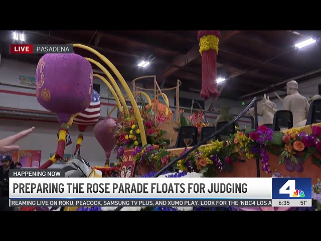 ⁣Finishing touches are made on the the Rose Parade floats