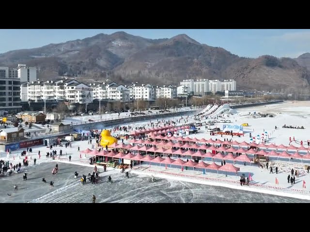 ⁣GLOBALink | Tourists embrace winter fun in Ji'an, China