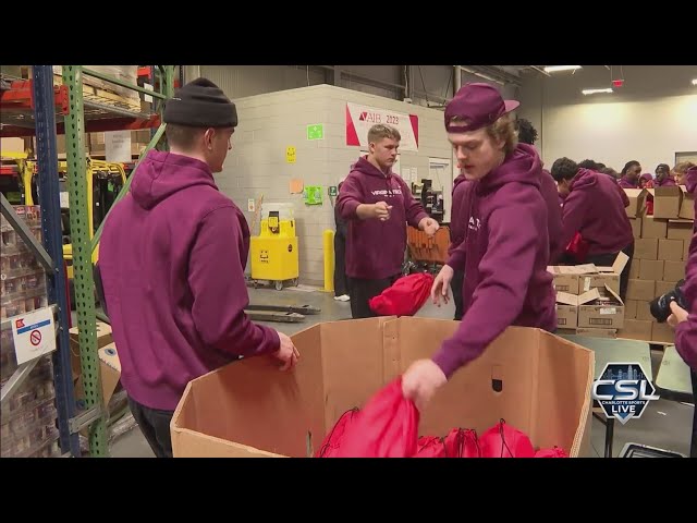 ⁣Mayo Bowl players pack food for those impacted by Helene