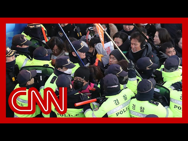 ⁣Arrest of impeached South Korean president suspended after tense standoff