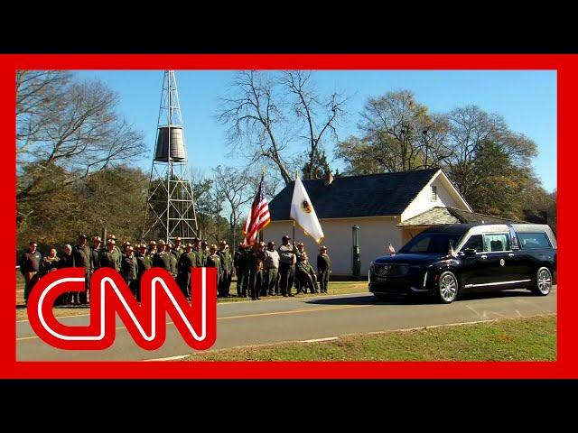 ⁣Jimmy Carter’s motorcade passes his boyhood home for the last time