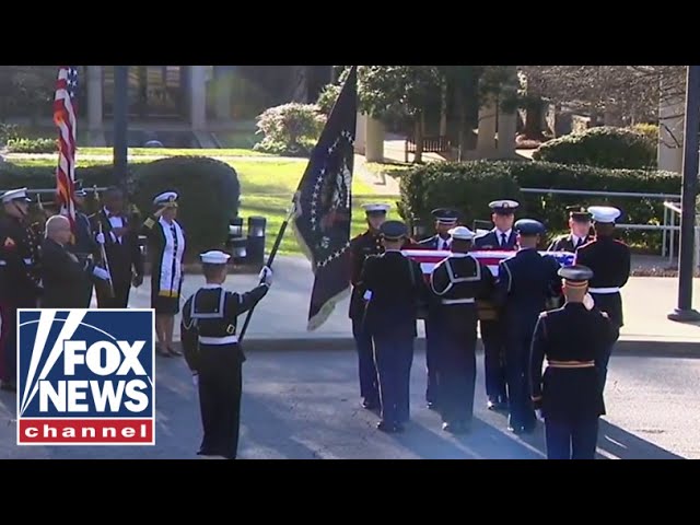 ⁣Former President Jimmy Carter’s motorcade arrives at Carter Center