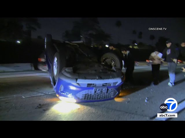 ⁣Good Samaritans rescue driver trapped in overturned car after crash in Los Angeles