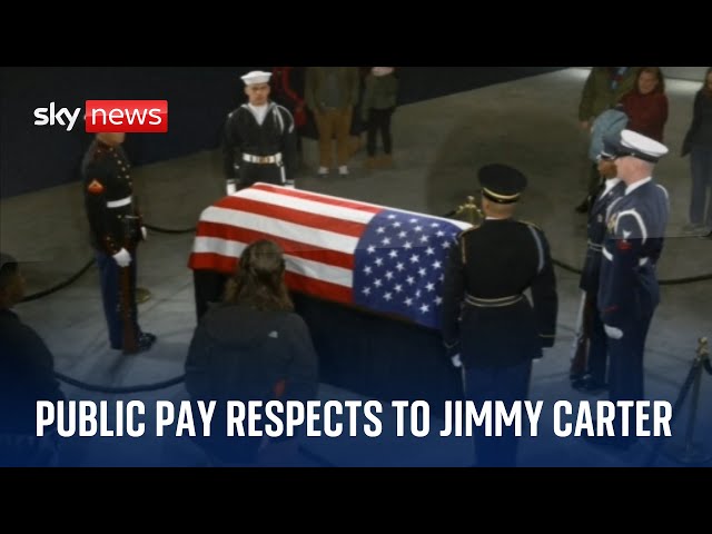 ⁣The public pay their respects to former US president Jimmy Carter