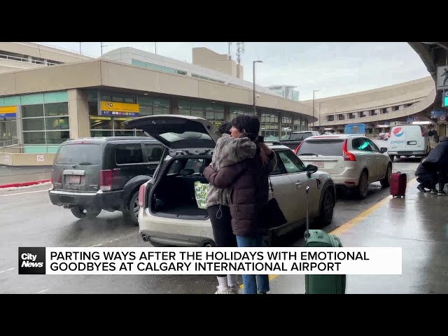 ⁣Parting ways after the holidays with emotional goodbyes at the Calgary International Airport