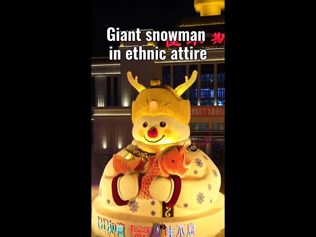 ⁣Giant snowman in traditional ethnic attire in NE China