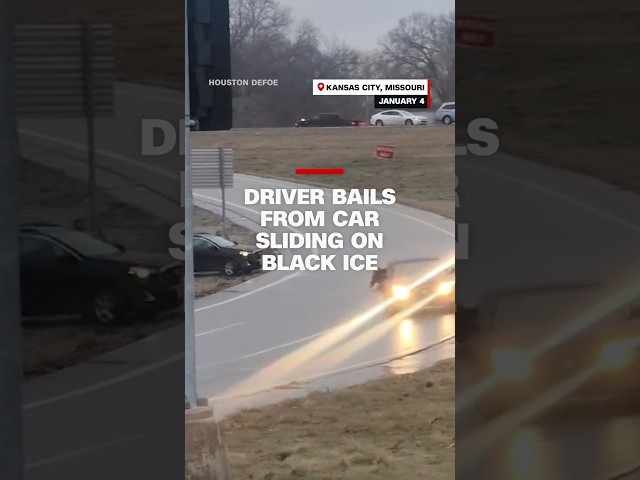 ⁣Driver bails from car sliding on black ice