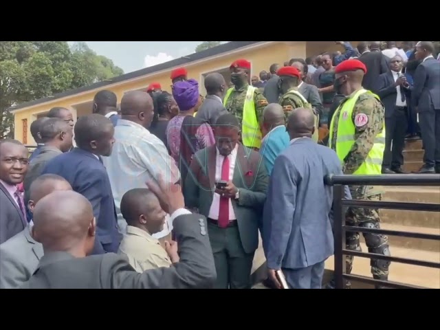 ⁣Besigye supporters protest as lawyers are denied entry to the court martial.