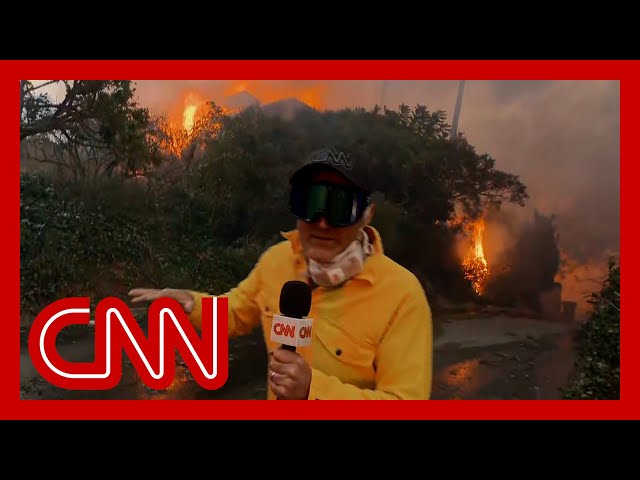 ⁣‘Out of control’: CNN reporter on scene describes Los Angeles wildfire conditions