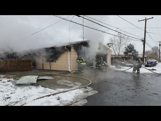 ⁣Denver firefighters keep garage fire from spreading to home