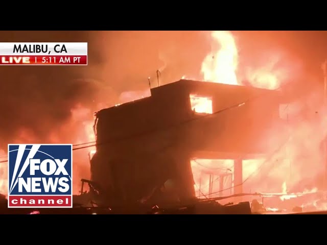 ⁣WATCH: Power line falls as strong winds fuel LA fires, engulfing homes