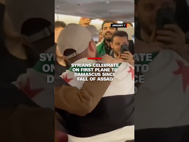 ⁣Syrians celebrate on first plane to Damascus since fall of Assad