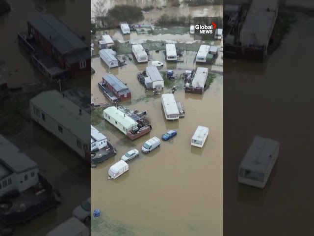 ⁣Drone captures UK caravan park submerged by floods after heavy rain