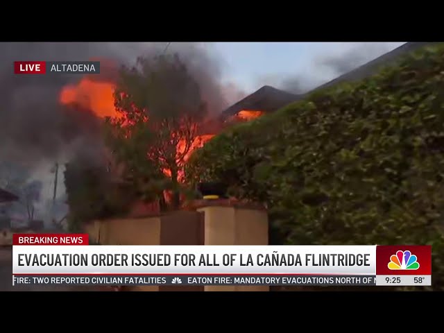 ⁣Father and son try to put out flames near their home in Altadena