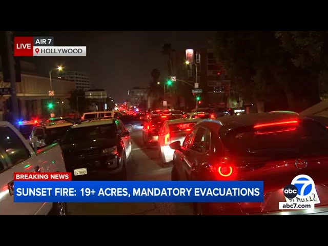 ⁣Traffic gridlock on Hollywood street as evacuations issued for Sunset Fire