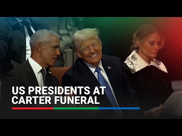 ⁣Trump shakes hands with Pence, engages Obama at Carter funeral