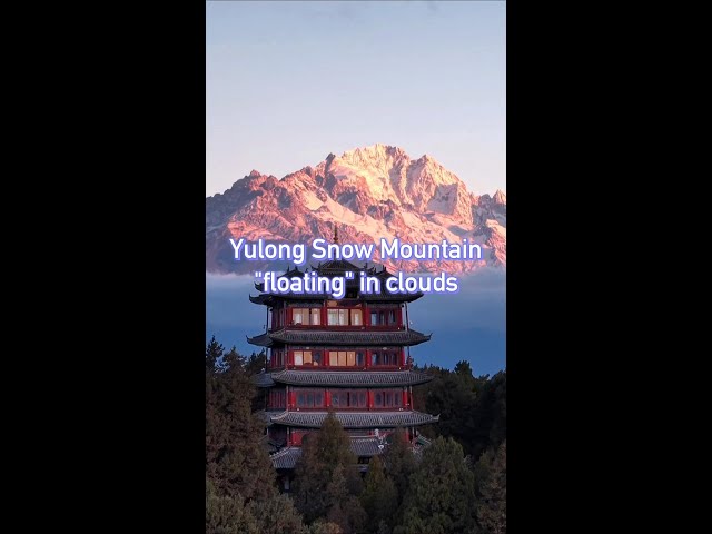 ⁣Yulong Snow Mountain "floating" in clouds