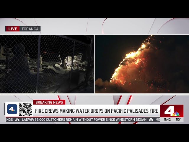 ⁣Fire crews making water drops on Pacific Palisades fire