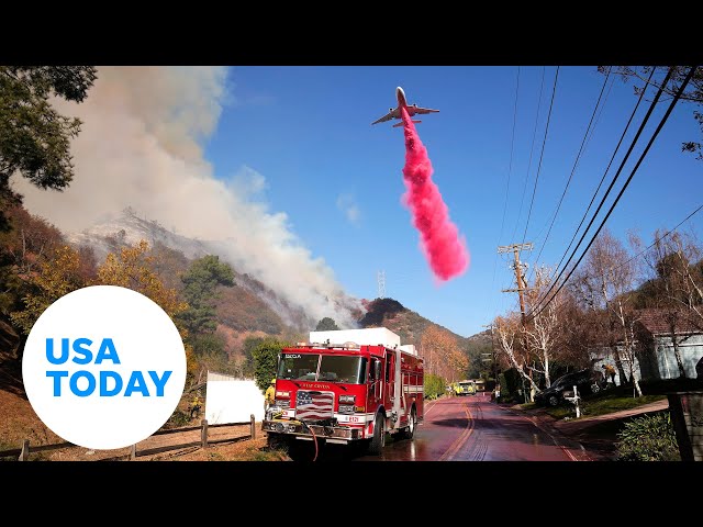 ⁣What’s the red stuff being dropped from airplanes on the wildfires? | USA TODAY