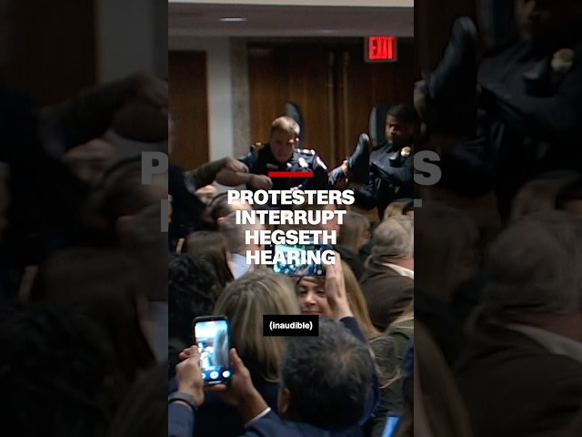 ⁣Protesters interrupt Hegseth hearing