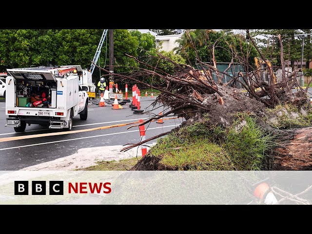 ⁣Body found in floodwaters and troops injured in Australia storm | BBC News