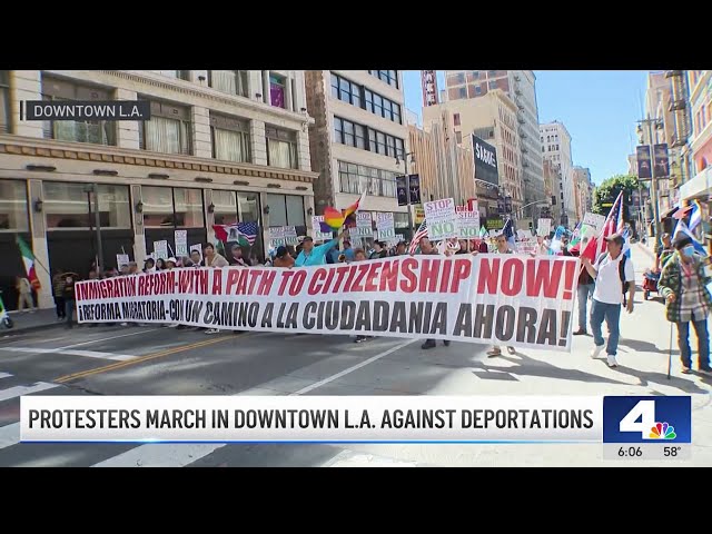 ⁣Protesters march in downtown LA against deportations