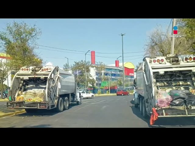 ⁣Vecinos de la alcaldía GAM, CDMX, solicitan a las autoridades retirar camiones de basura | Imagen