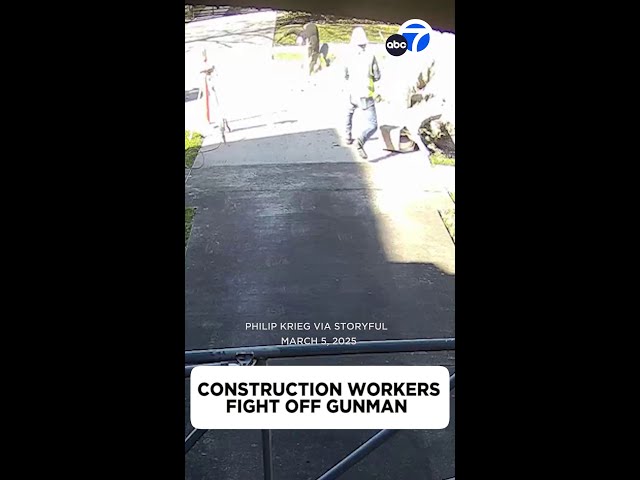 ⁣Construction workers fight off gunman