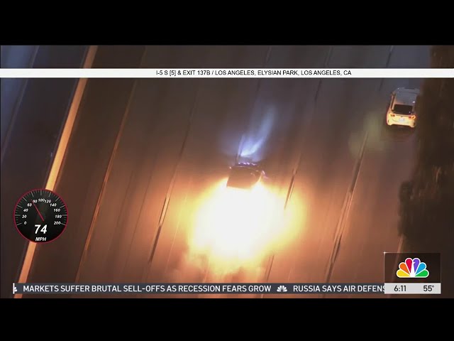 ⁣Fireball shoots from under car in high-speed LA chase