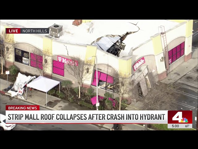 ⁣Strip mall roof collapses after fire hydrant crash in North Hills