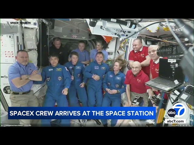 NASA's stuck astronauts welcome their newly arrived replacements to the space station